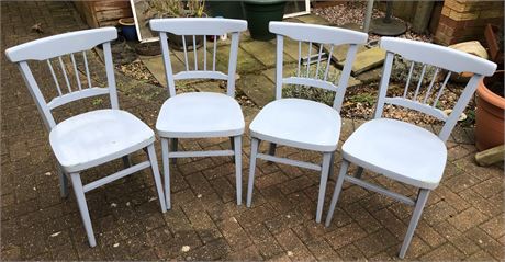 Four painted solid wood chairs...