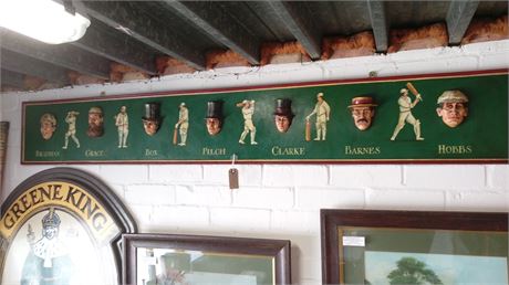 Cricketers of yesteryear. Large wooden carved panel showing 7 famous cricketers.