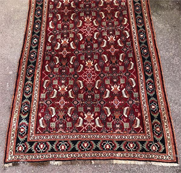 Turkish style red ground rug.
