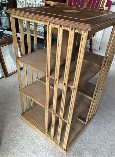 Modern version of the traditional library style rotating bookcase.